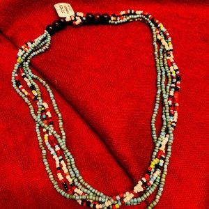 A multi-strand beaded necklace